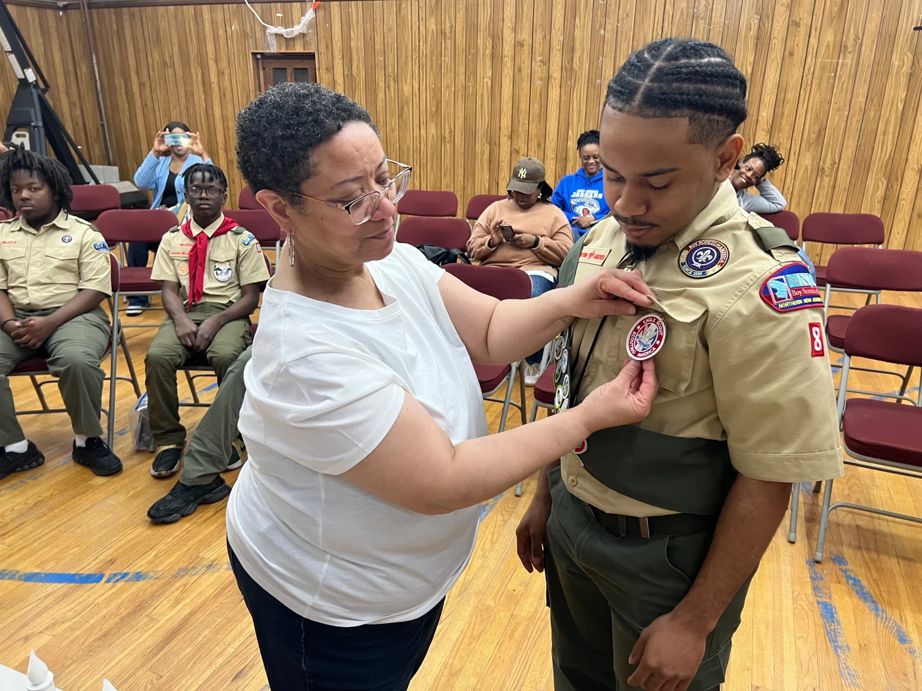 Family takes part in the pinning ceremony.