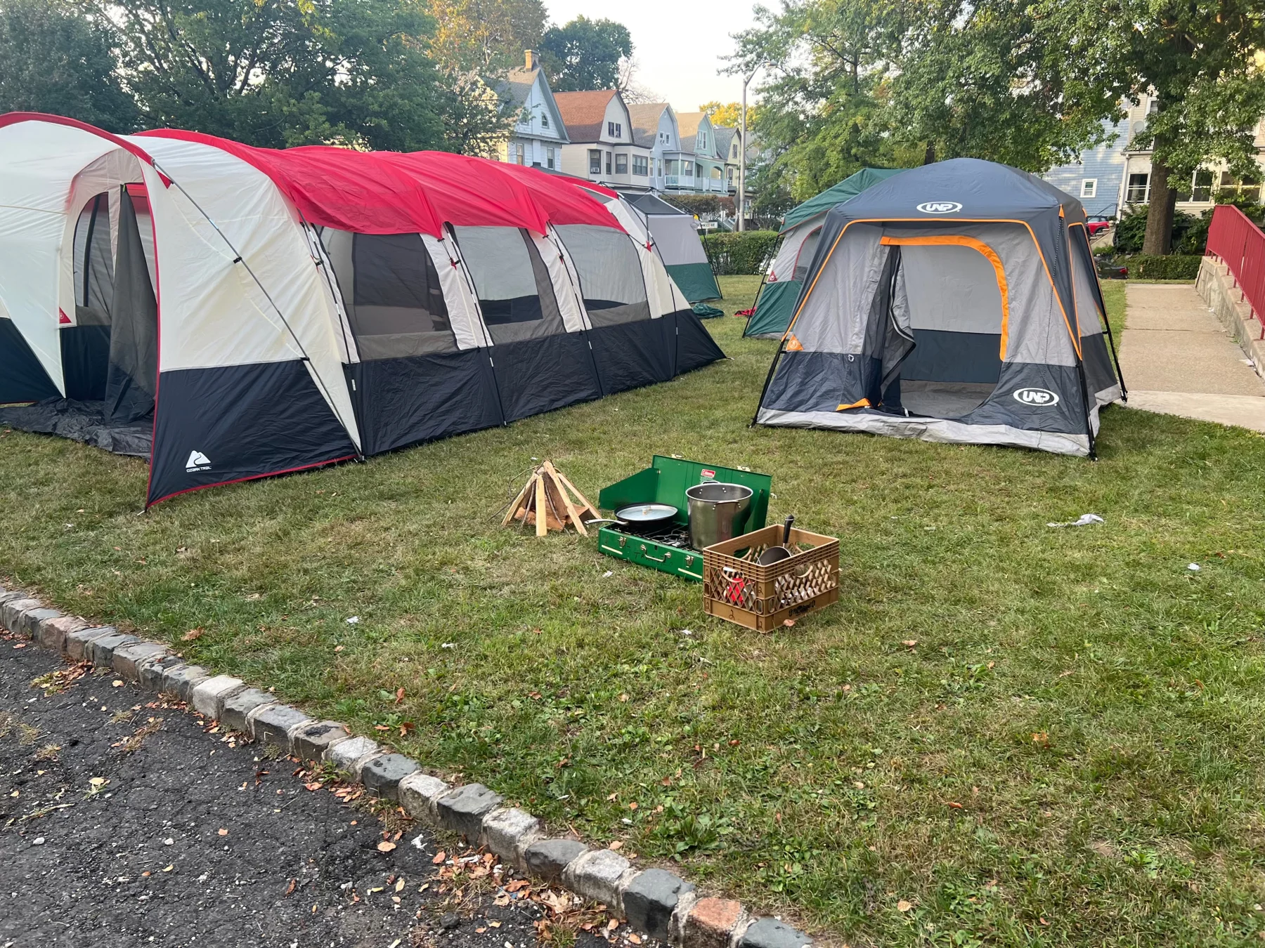 Pitched tents and equipment ready for outdoor skills practice.